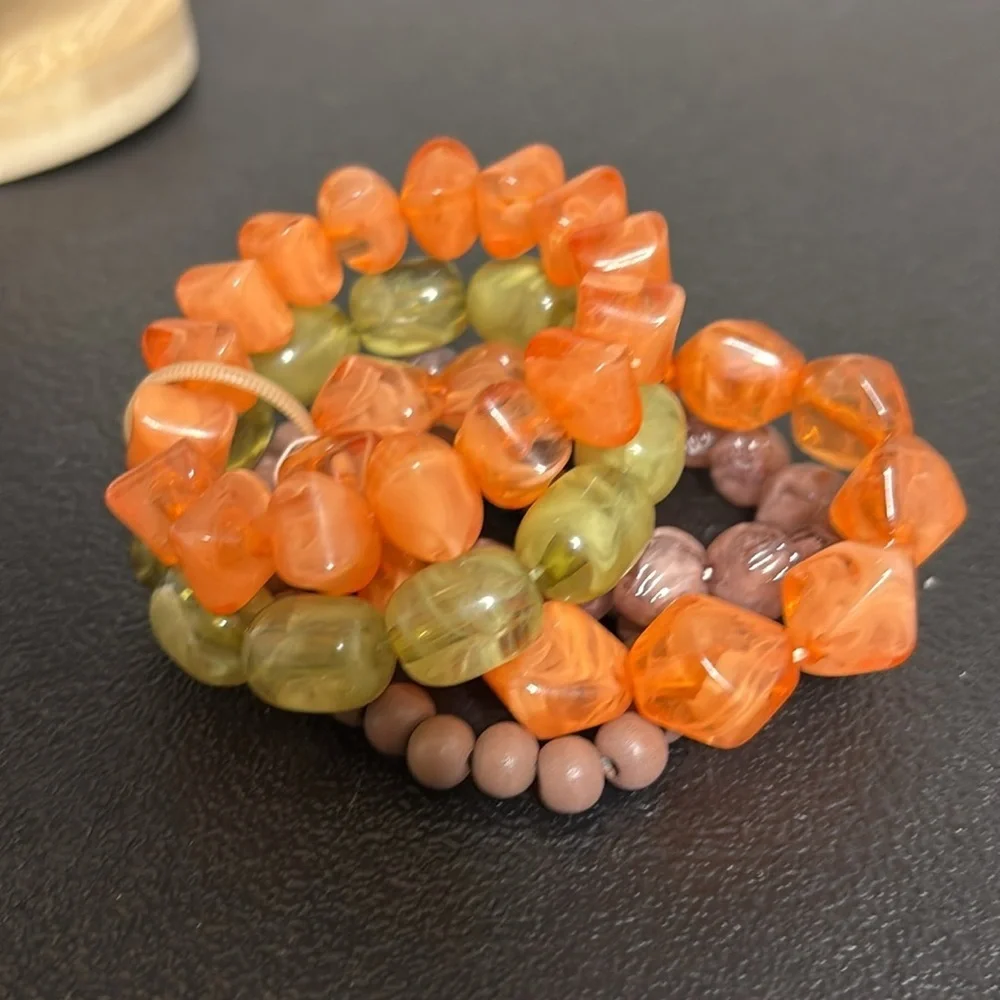 Colorful Beaded Stretch Bracelet with Orange and Green Accents
